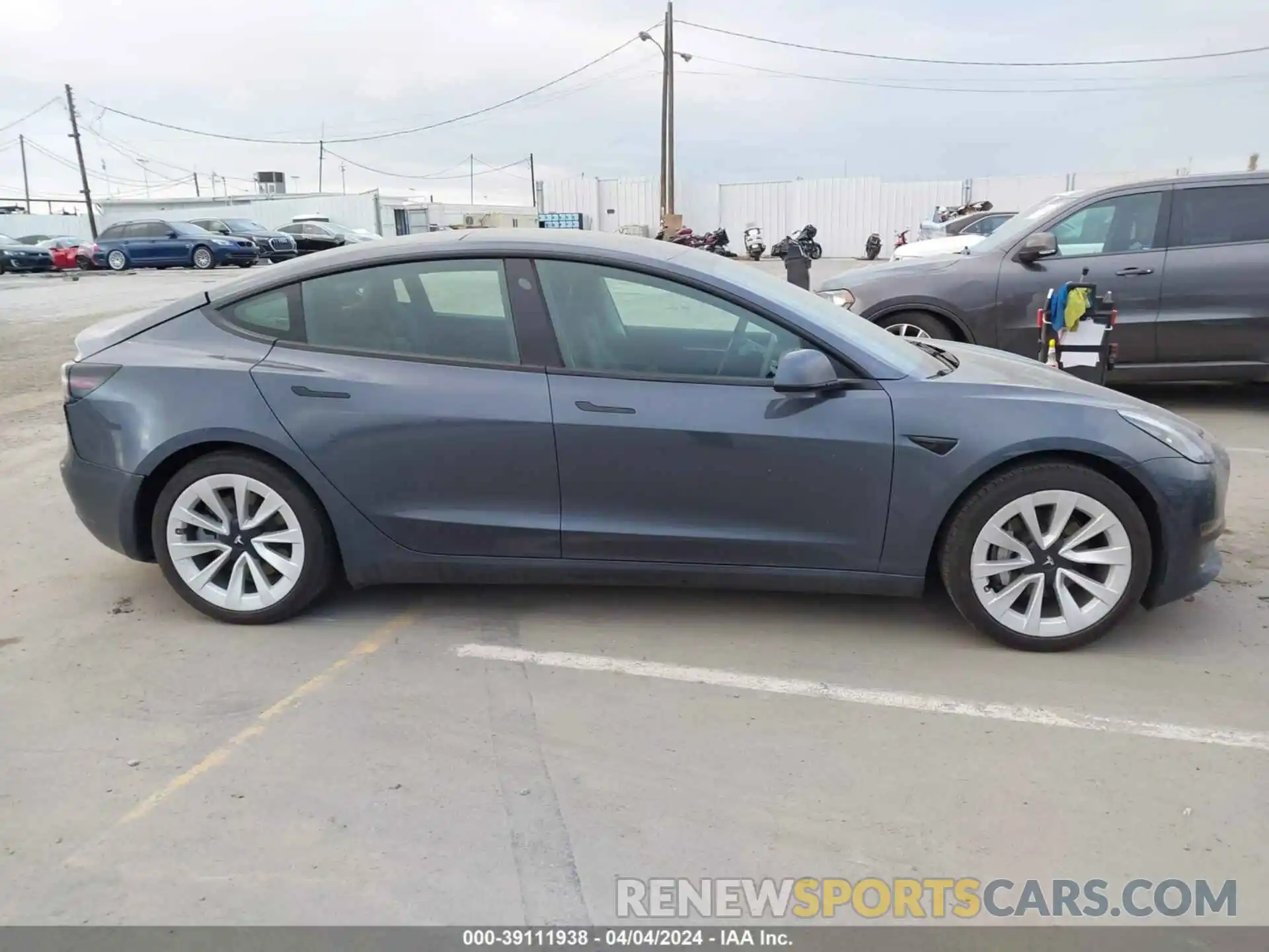 12 Photograph of a damaged car 5YJ3E1EB4NF322261 TESLA MODEL 3 2022