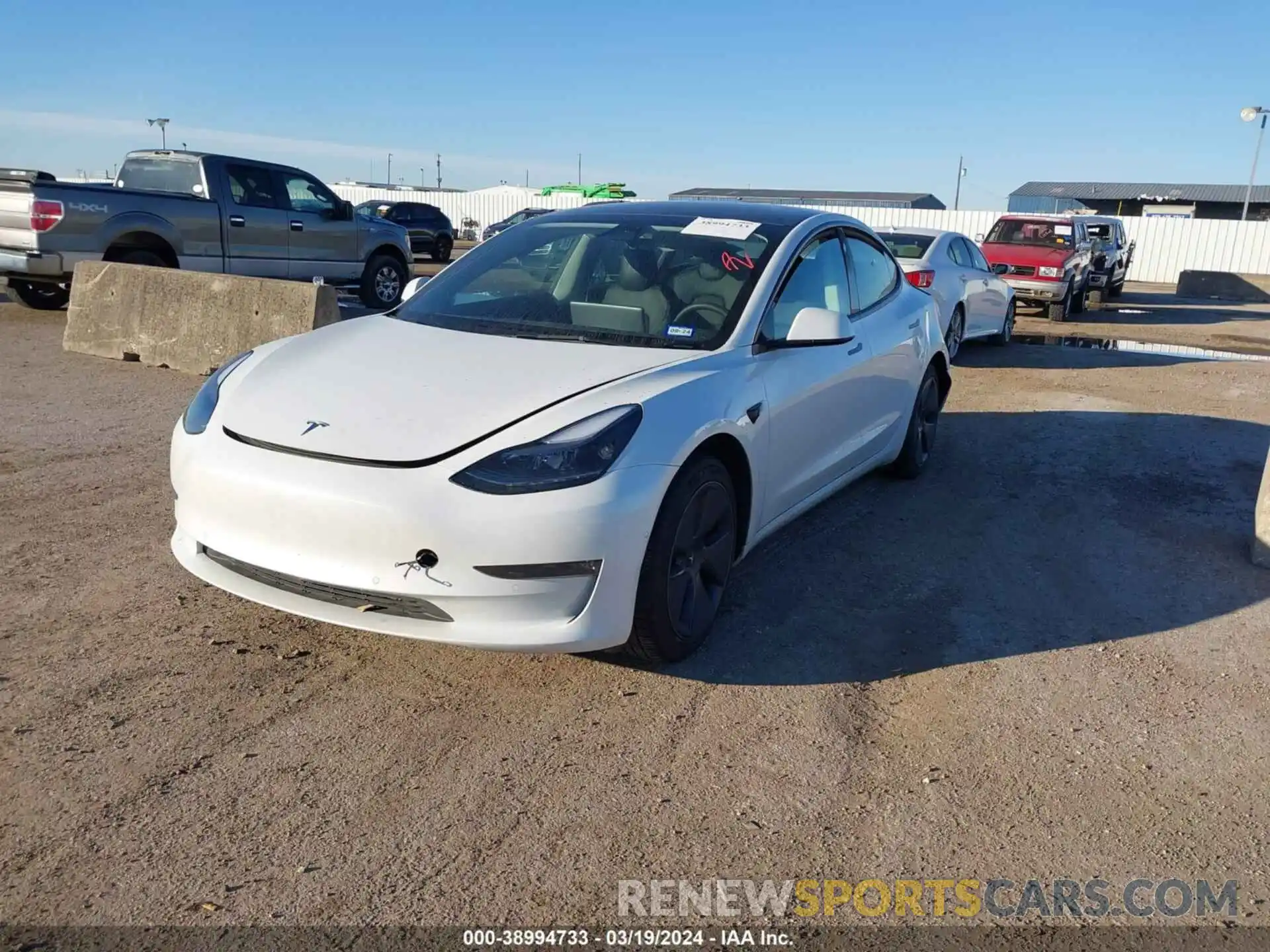 2 Photograph of a damaged car 5YJ3E1EB4NF334586 TESLA MODEL 3 2022