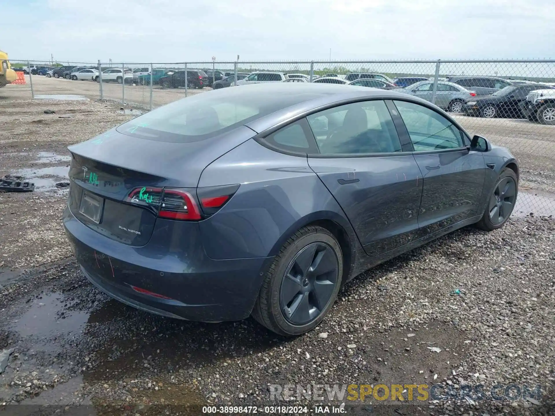 4 Photograph of a damaged car 5YJ3E1EB5NF113188 TESLA MODEL 3 2022