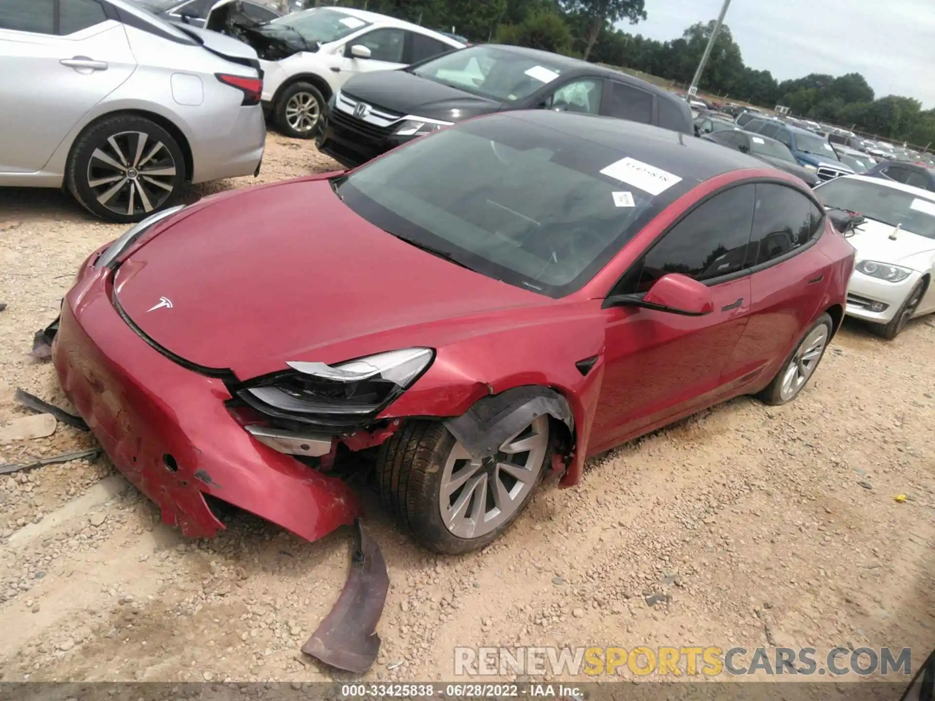 2 Photograph of a damaged car 5YJ3E1EB5NF117709 TESLA MODEL 3 2022