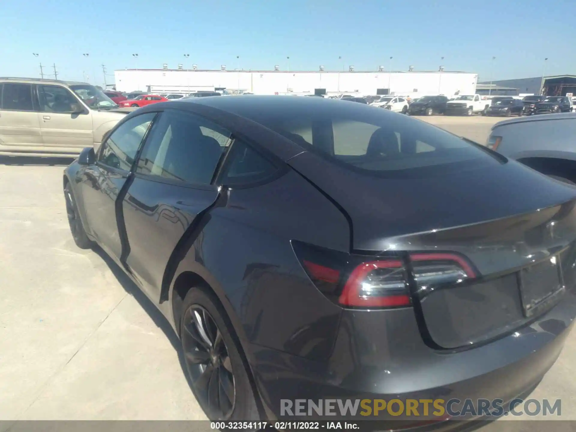 3 Photograph of a damaged car 5YJ3E1EB5NF128693 TESLA MODEL 3 2022