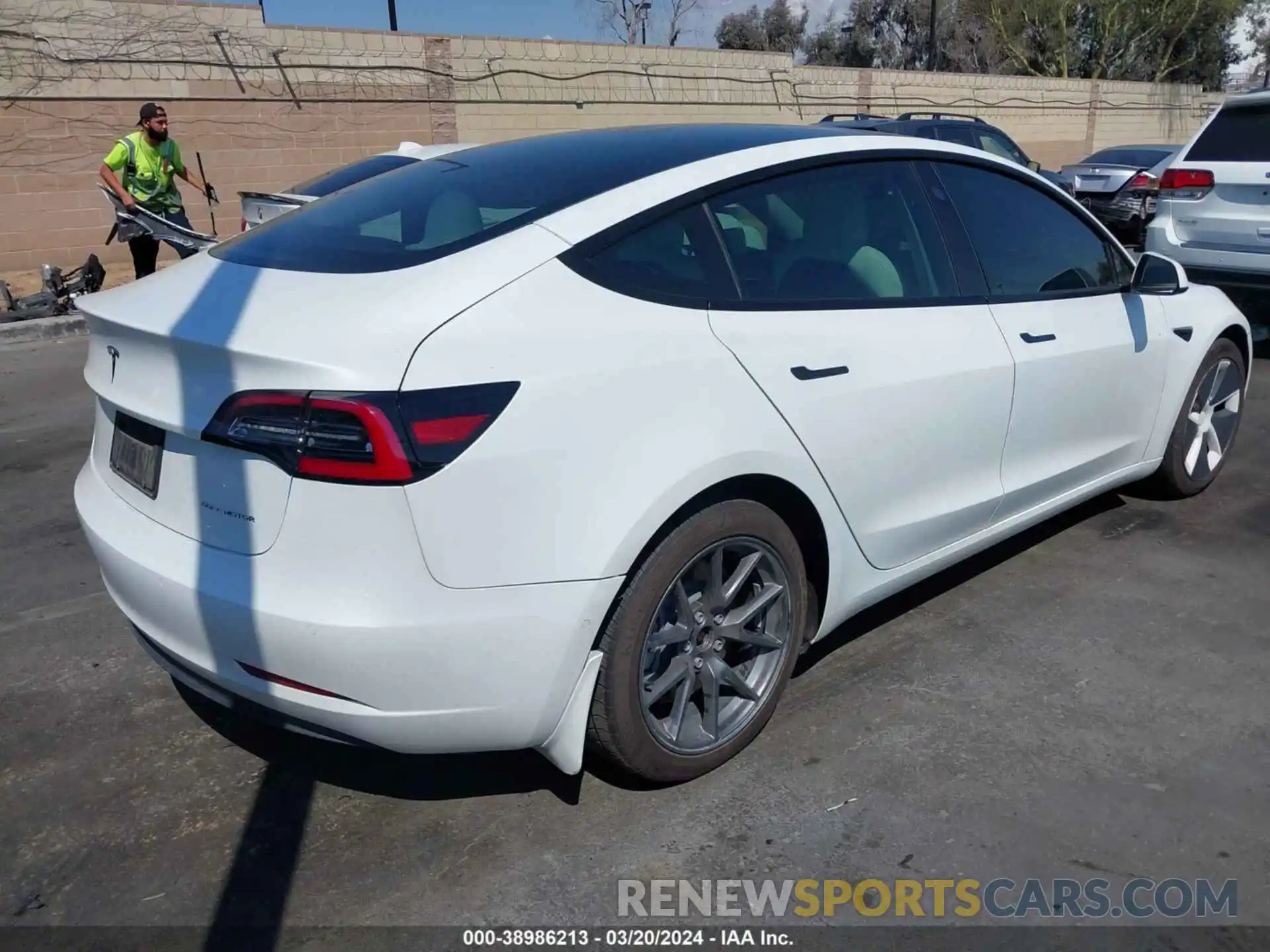 4 Photograph of a damaged car 5YJ3E1EB5NF135451 TESLA MODEL 3 2022