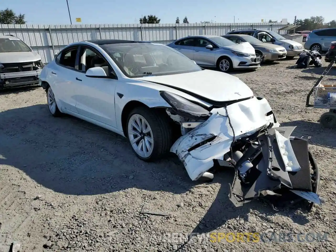 1 Photograph of a damaged car 5YJ3E1EB5NF144618 TESLA MODEL 3 2022