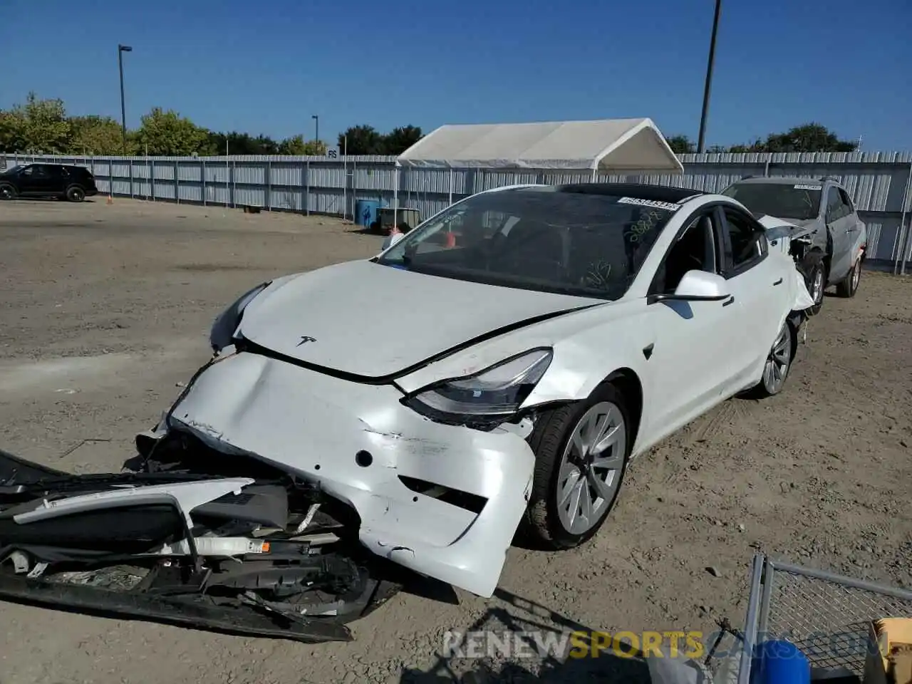 2 Photograph of a damaged car 5YJ3E1EB5NF144618 TESLA MODEL 3 2022