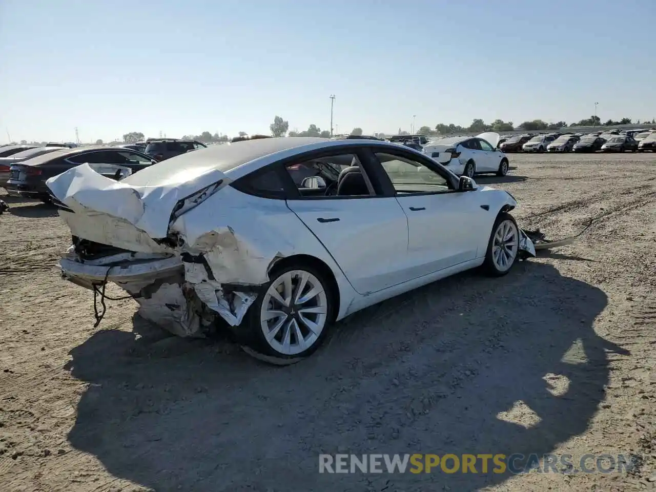 4 Photograph of a damaged car 5YJ3E1EB5NF144618 TESLA MODEL 3 2022