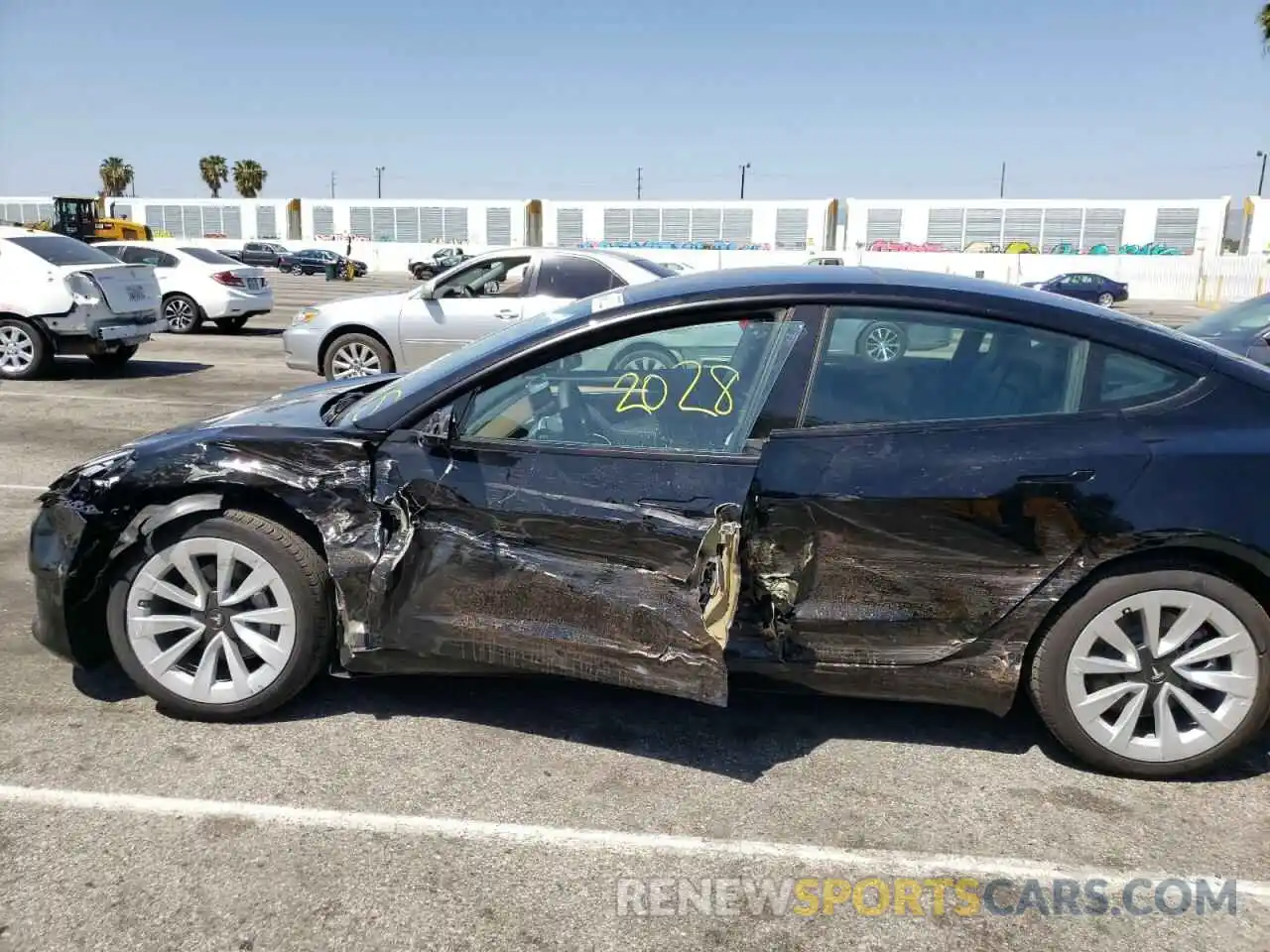 9 Photograph of a damaged car 5YJ3E1EB5NF145767 TESLA MODEL 3 2022