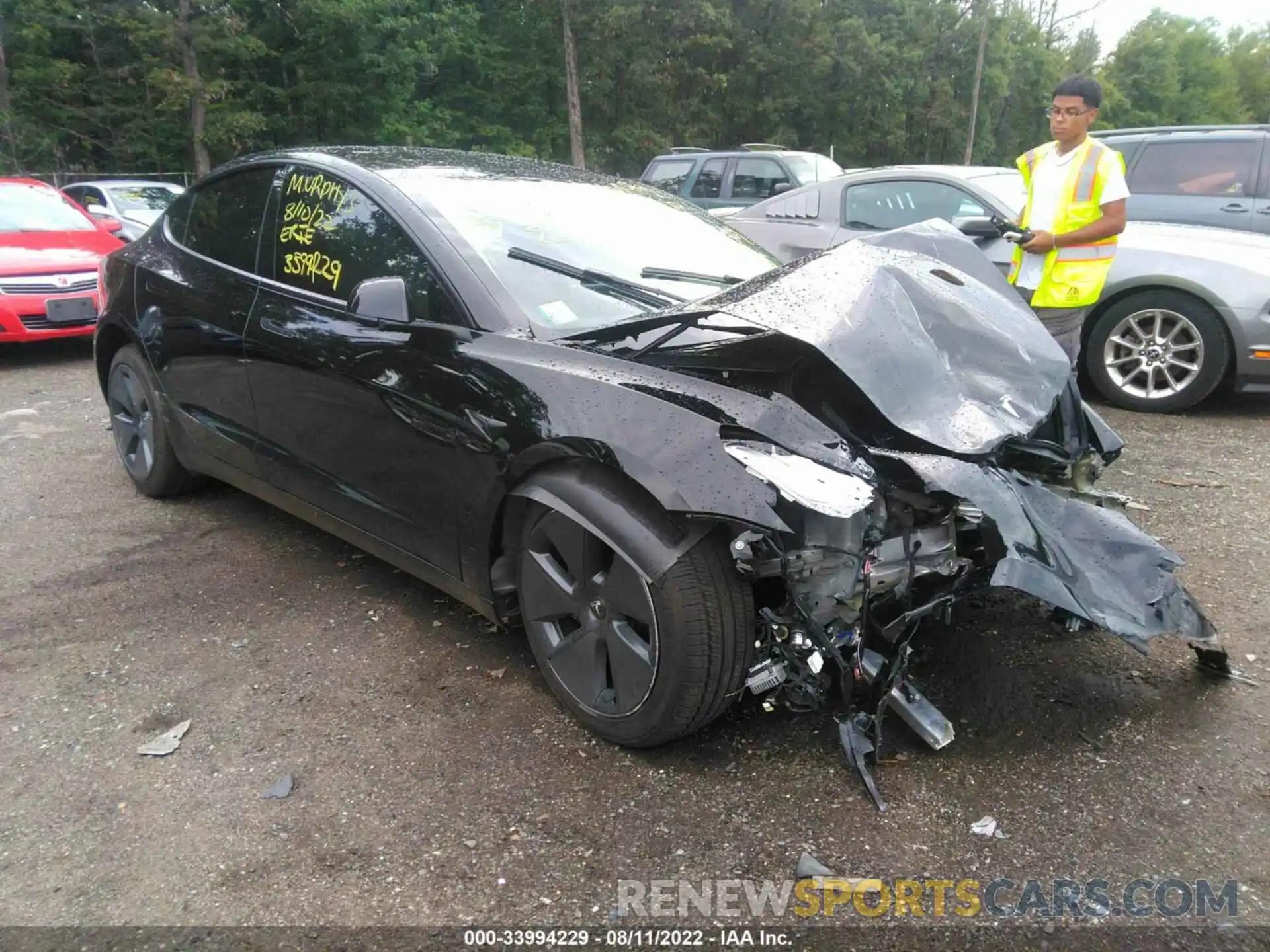 1 Photograph of a damaged car 5YJ3E1EB5NF167185 TESLA MODEL 3 2022