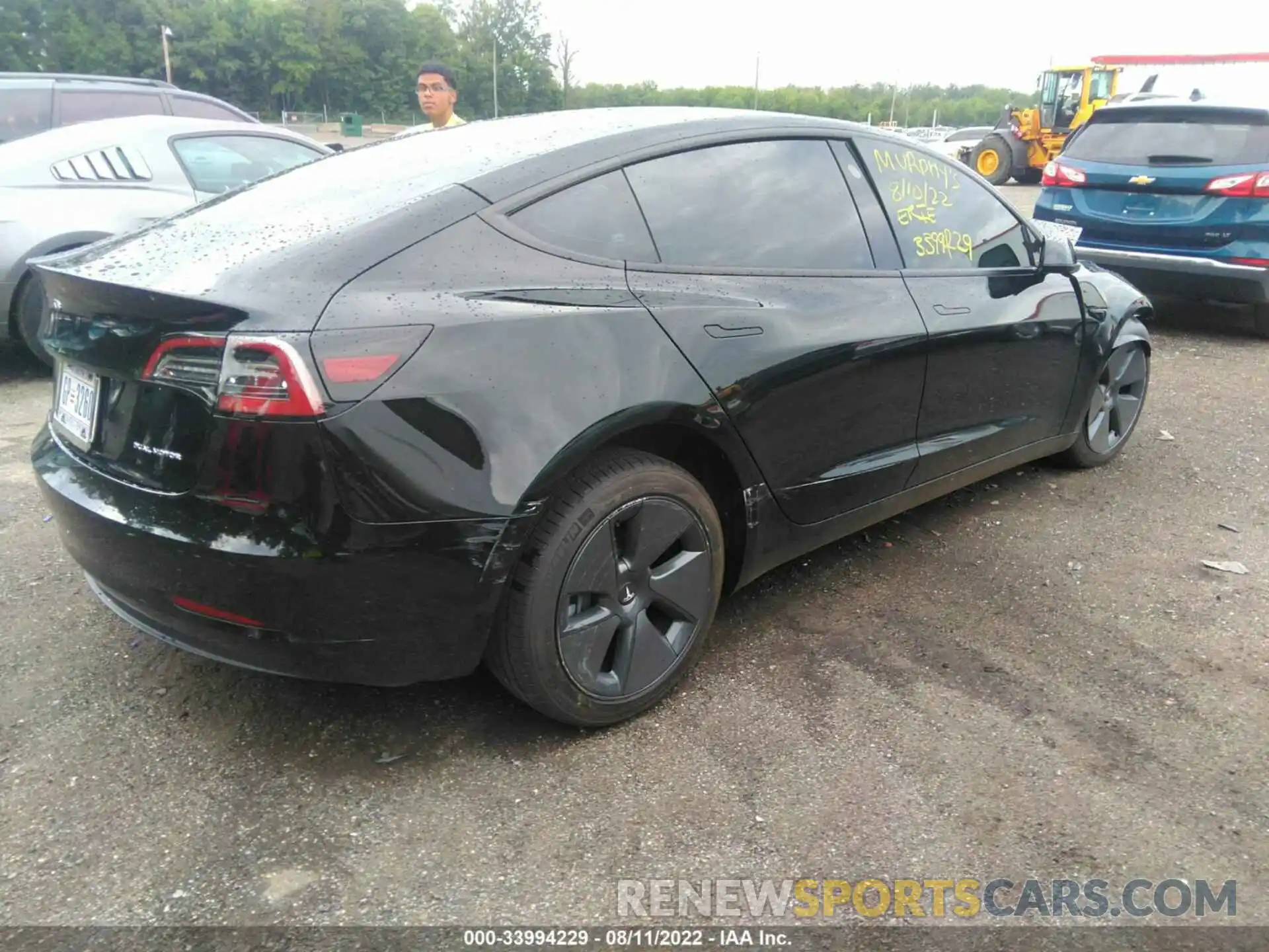 4 Photograph of a damaged car 5YJ3E1EB5NF167185 TESLA MODEL 3 2022