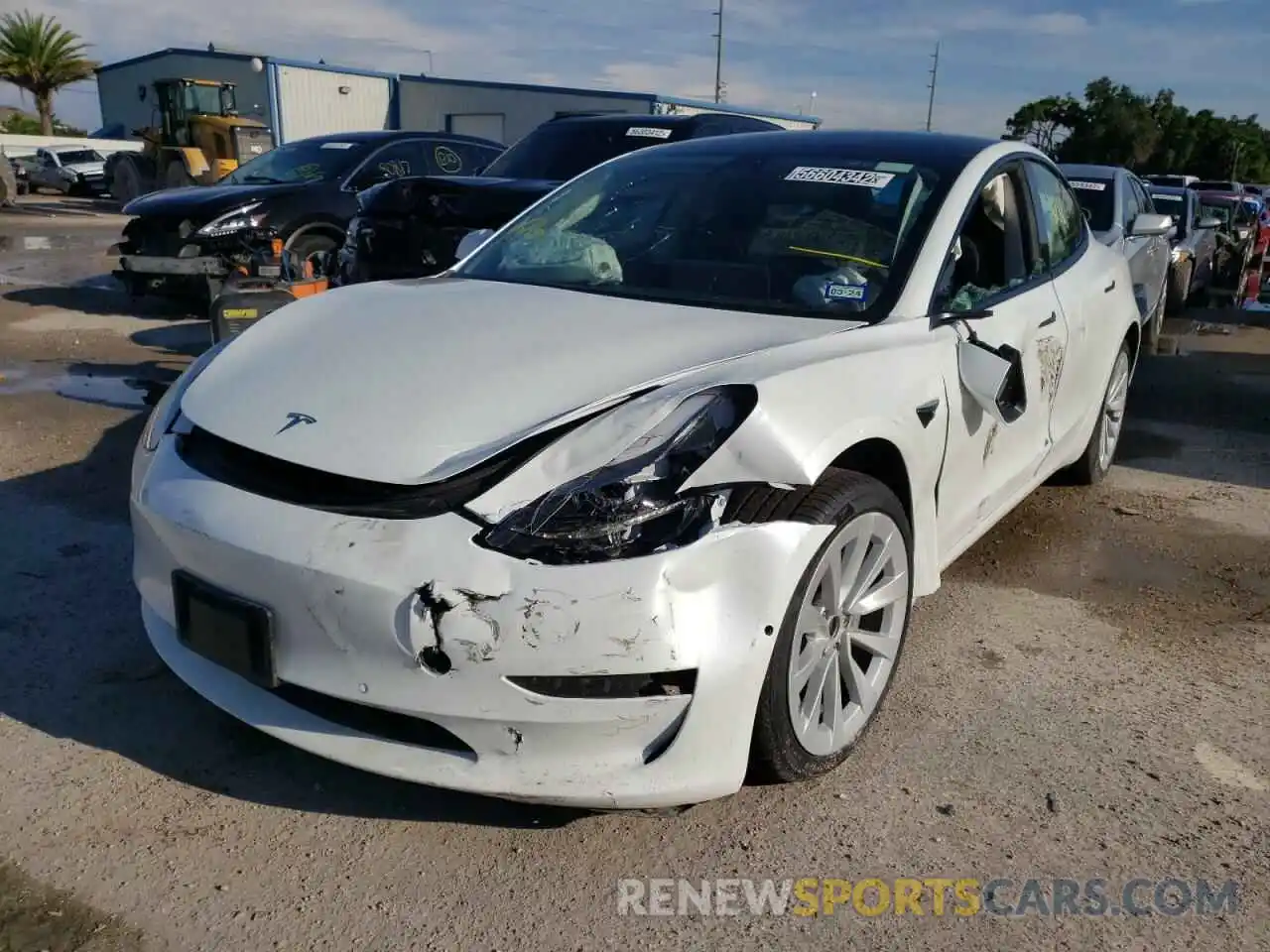 2 Photograph of a damaged car 5YJ3E1EB5NF185122 TESLA MODEL 3 2022