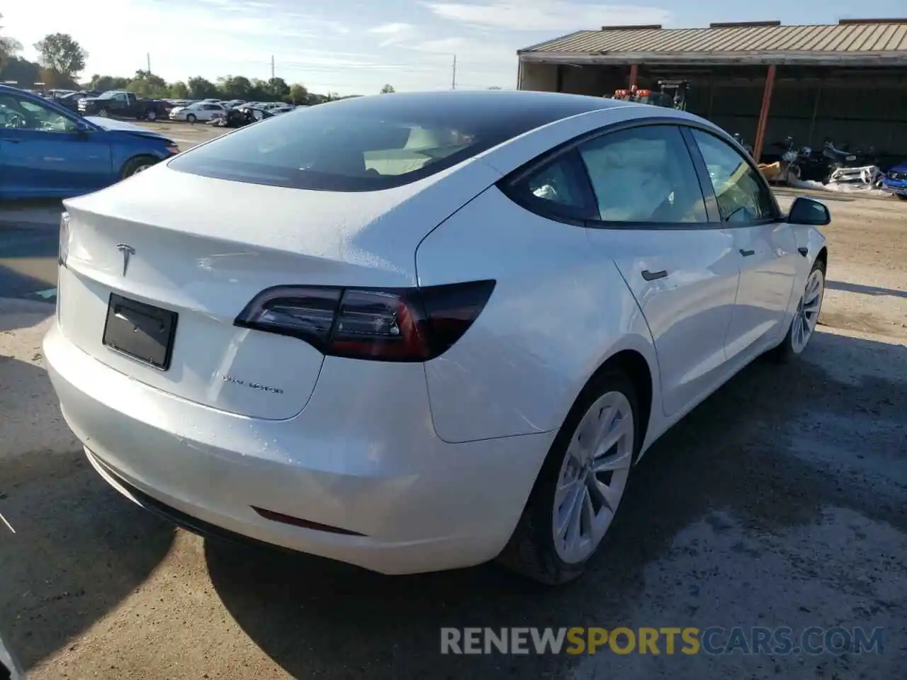 4 Photograph of a damaged car 5YJ3E1EB5NF185122 TESLA MODEL 3 2022