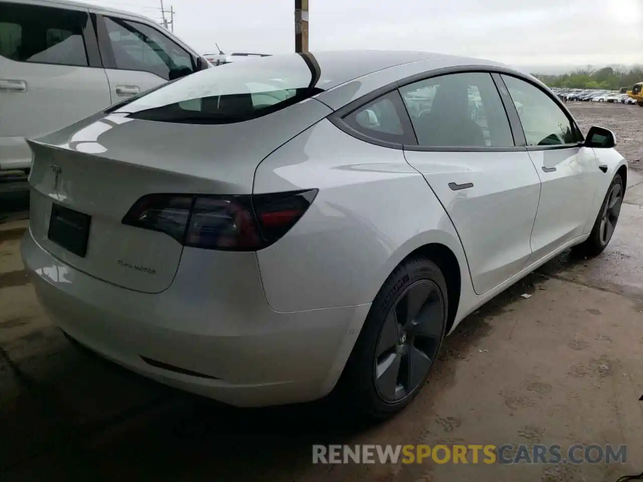 4 Photograph of a damaged car 5YJ3E1EB5NF193138 TESLA MODEL 3 2022