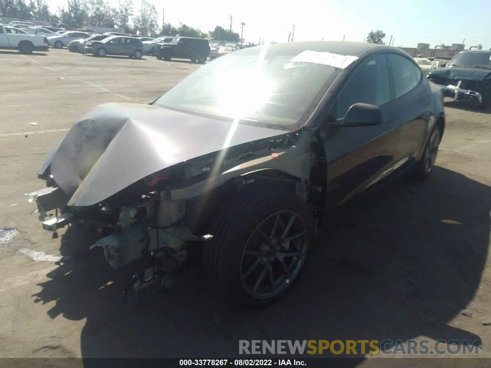 2 Photograph of a damaged car 5YJ3E1EB5NF199442 TESLA MODEL 3 2022