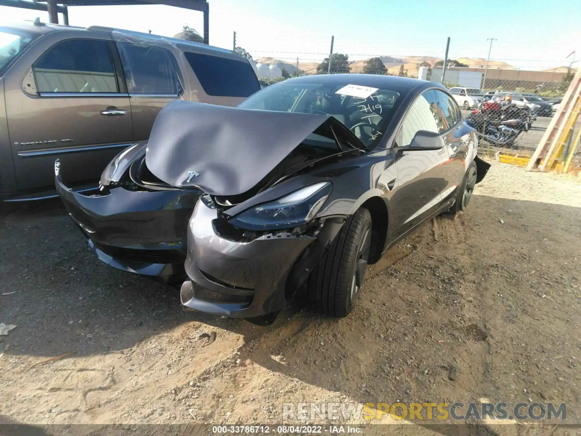 2 Photograph of a damaged car 5YJ3E1EB5NF207958 TESLA MODEL 3 2022