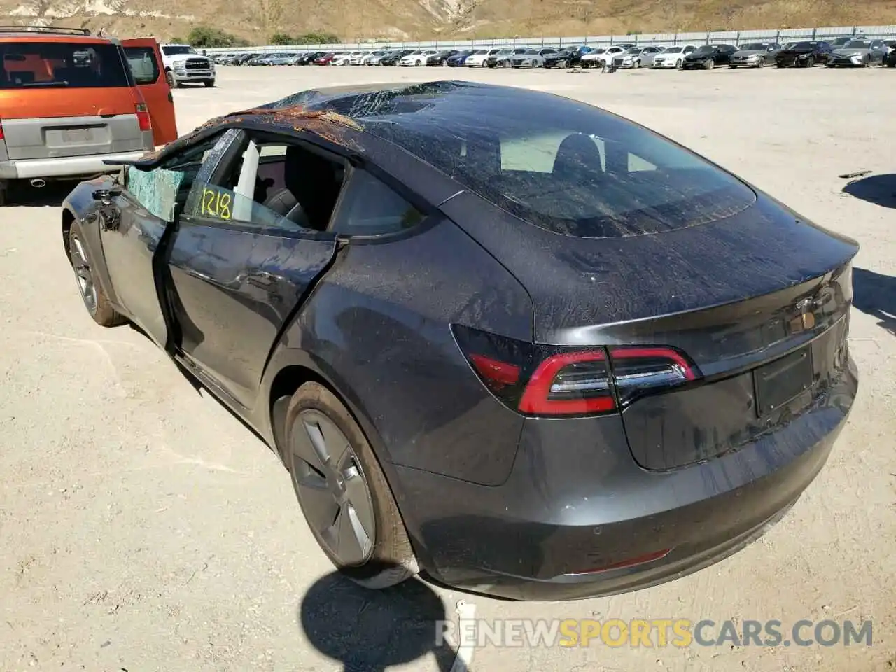 3 Photograph of a damaged car 5YJ3E1EB5NF237297 TESLA MODEL 3 2022