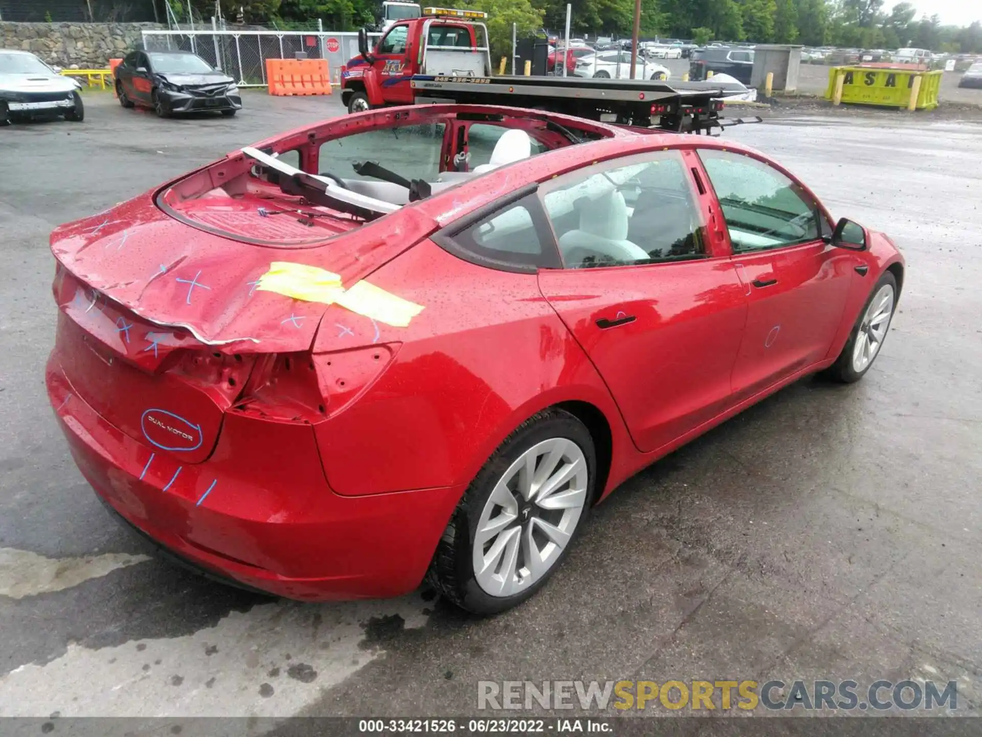 4 Photograph of a damaged car 5YJ3E1EB6NF117671 TESLA MODEL 3 2022