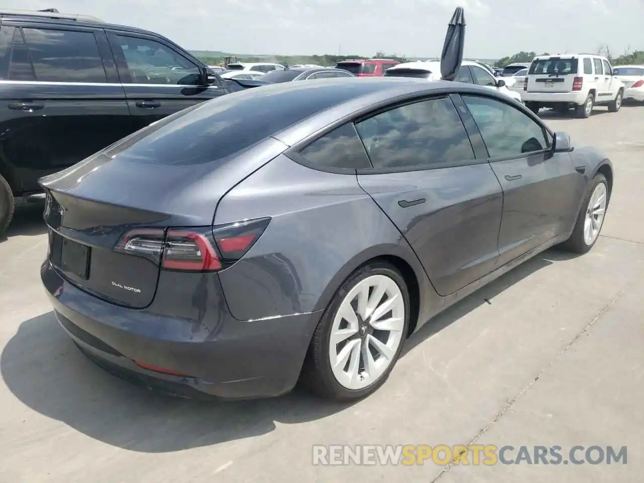 4 Photograph of a damaged car 5YJ3E1EB6NF127357 TESLA MODEL 3 2022