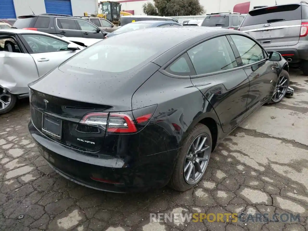 4 Фотография поврежденного автомобиля 5YJ3E1EB6NF147303 TESLA MODEL 3 2022