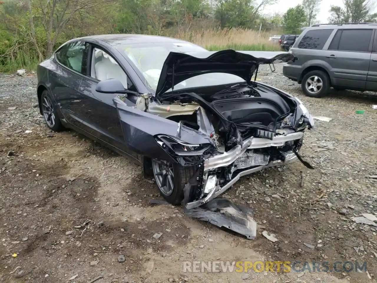 1 Photograph of a damaged car 5YJ3E1EB6NF155062 TESLA MODEL 3 2022