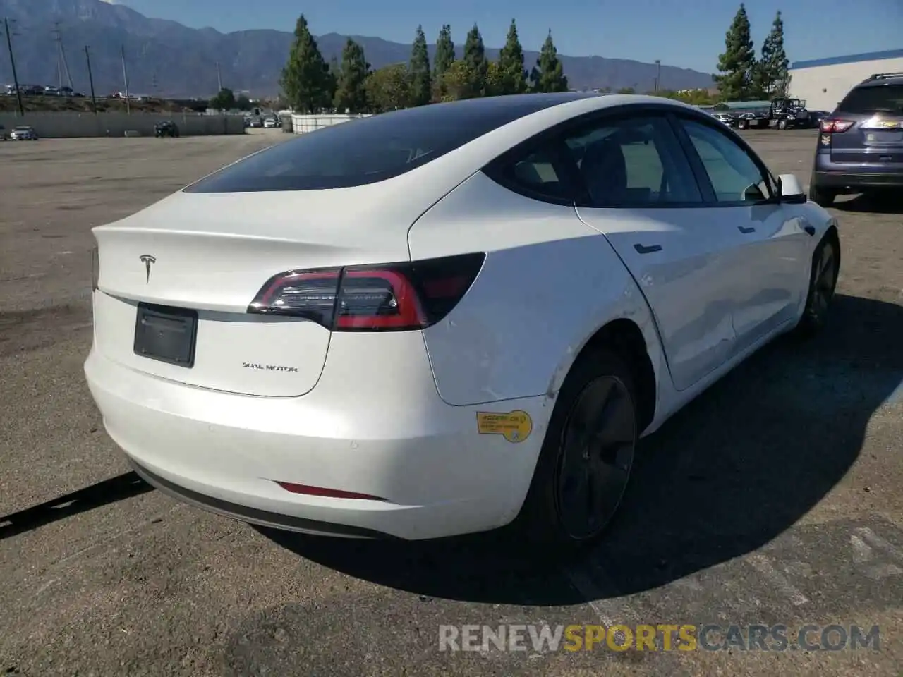 4 Photograph of a damaged car 5YJ3E1EB6NF169544 TESLA MODEL 3 2022