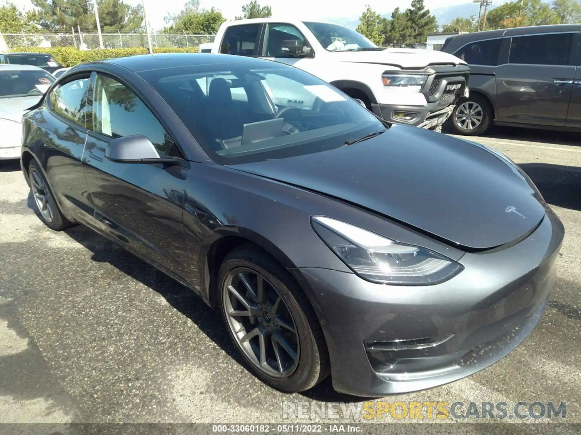 1 Photograph of a damaged car 5YJ3E1EB6NF180155 TESLA MODEL 3 2022