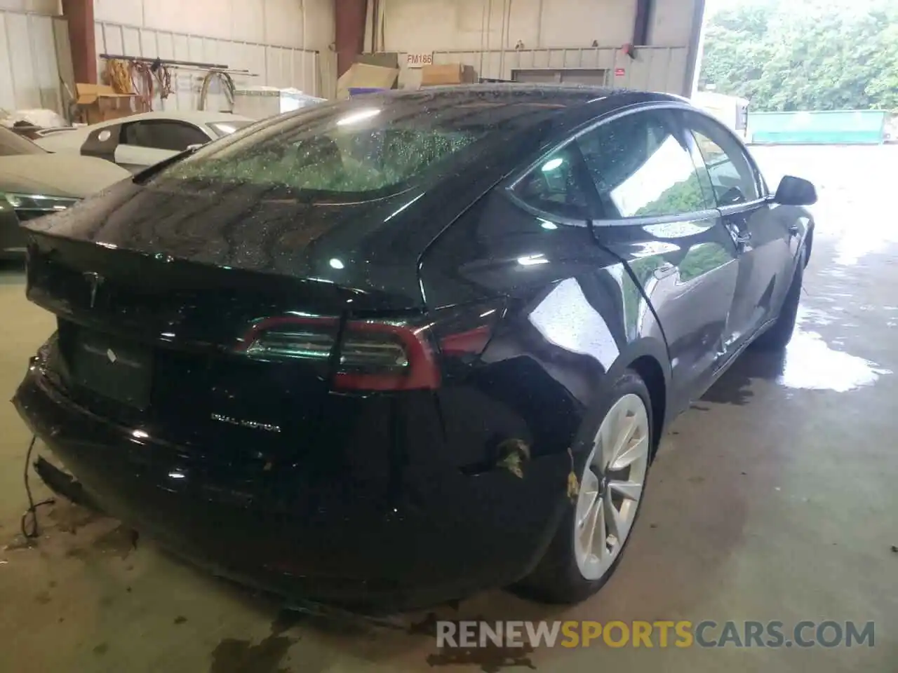 4 Photograph of a damaged car 5YJ3E1EB6NF185520 TESLA MODEL 3 2022