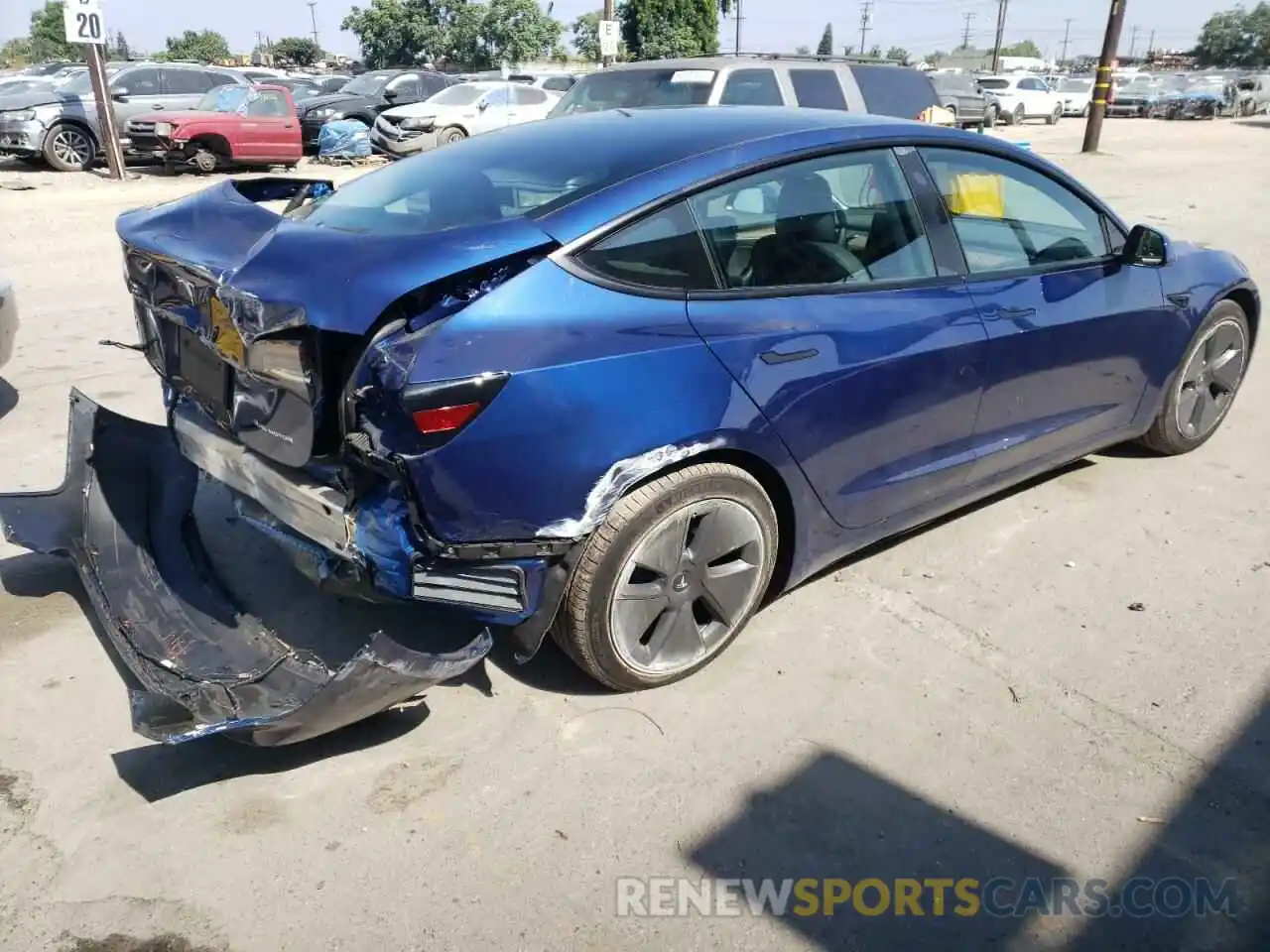 4 Photograph of a damaged car 5YJ3E1EB6NF189681 TESLA MODEL 3 2022