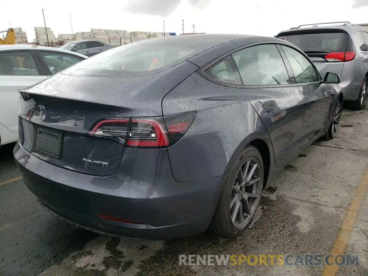 4 Photograph of a damaged car 5YJ3E1EB6NF190328 TESLA MODEL 3 2022