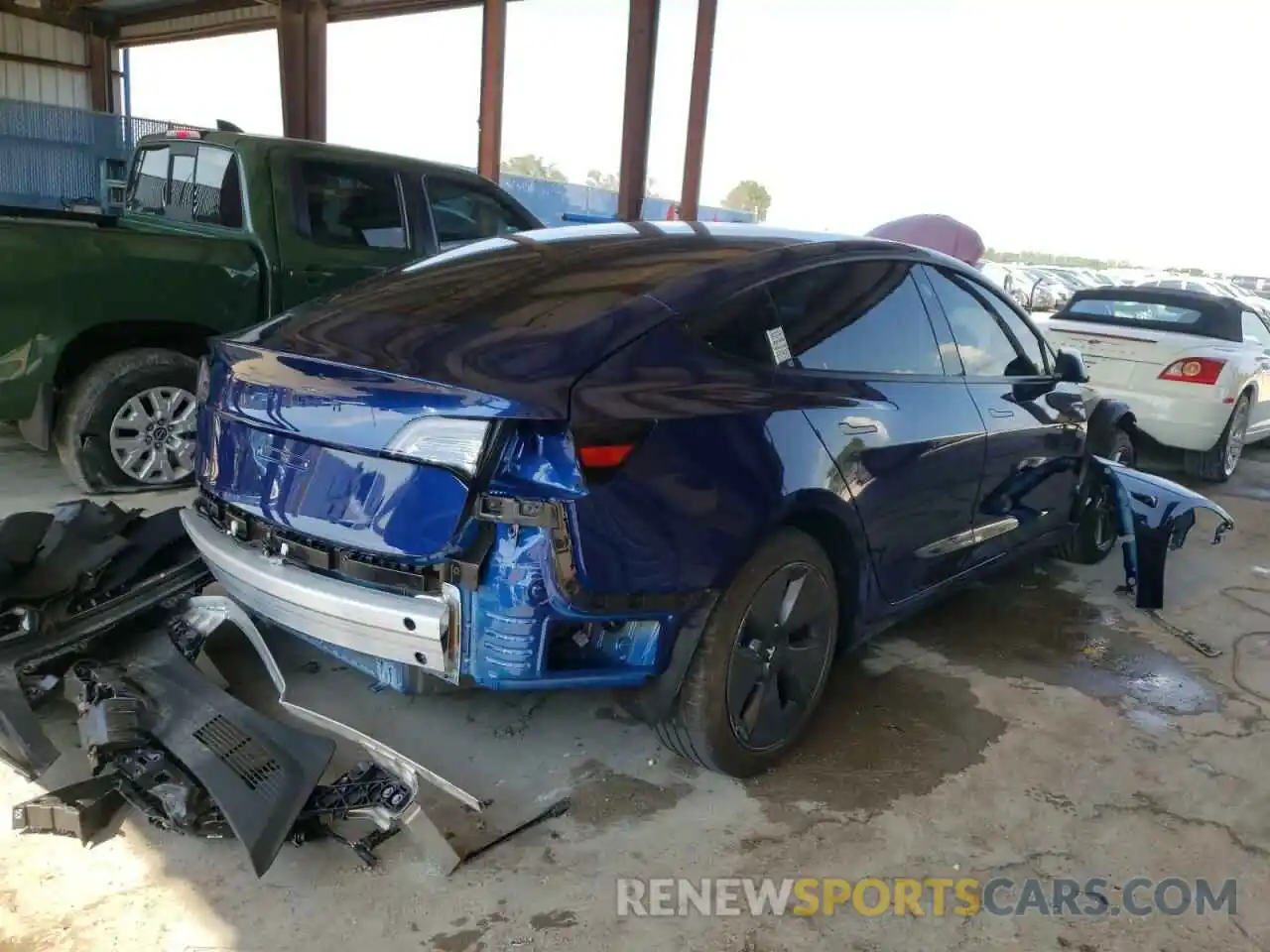 4 Photograph of a damaged car 5YJ3E1EB6NF200212 TESLA MODEL 3 2022