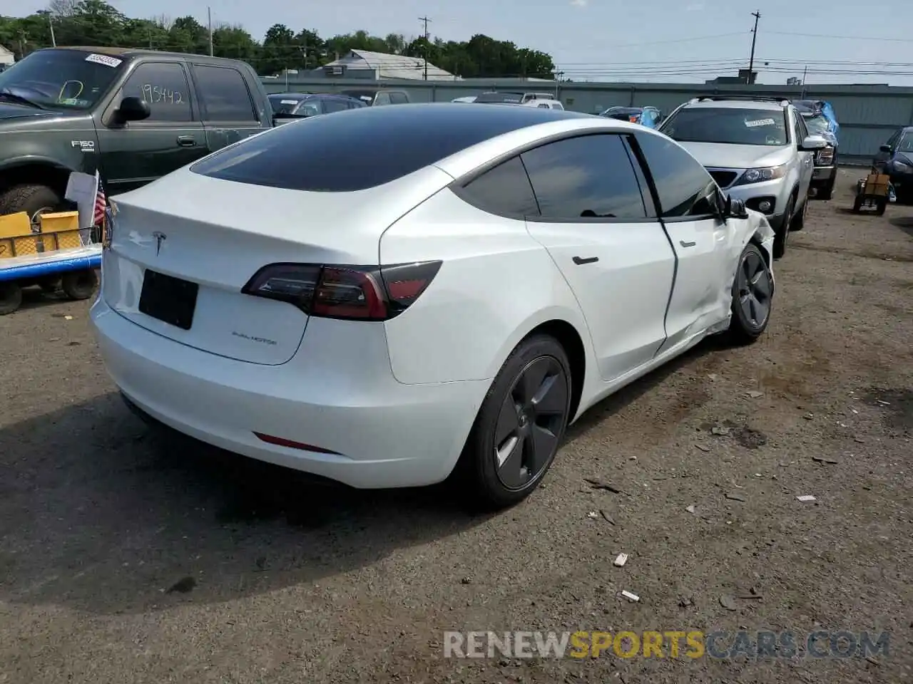 4 Photograph of a damaged car 5YJ3E1EB6NF273953 TESLA MODEL 3 2022