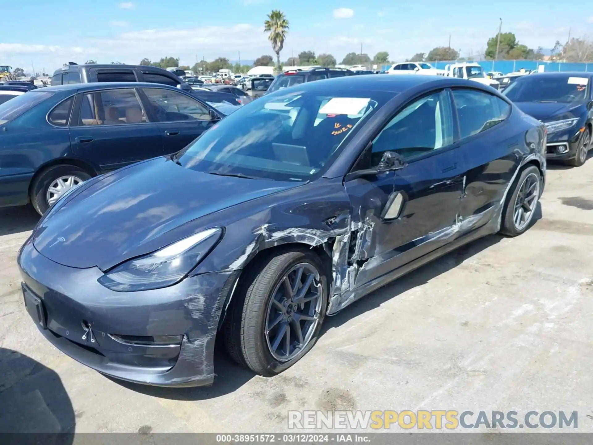 2 Photograph of a damaged car 5YJ3E1EB6NF358887 TESLA MODEL 3 2022