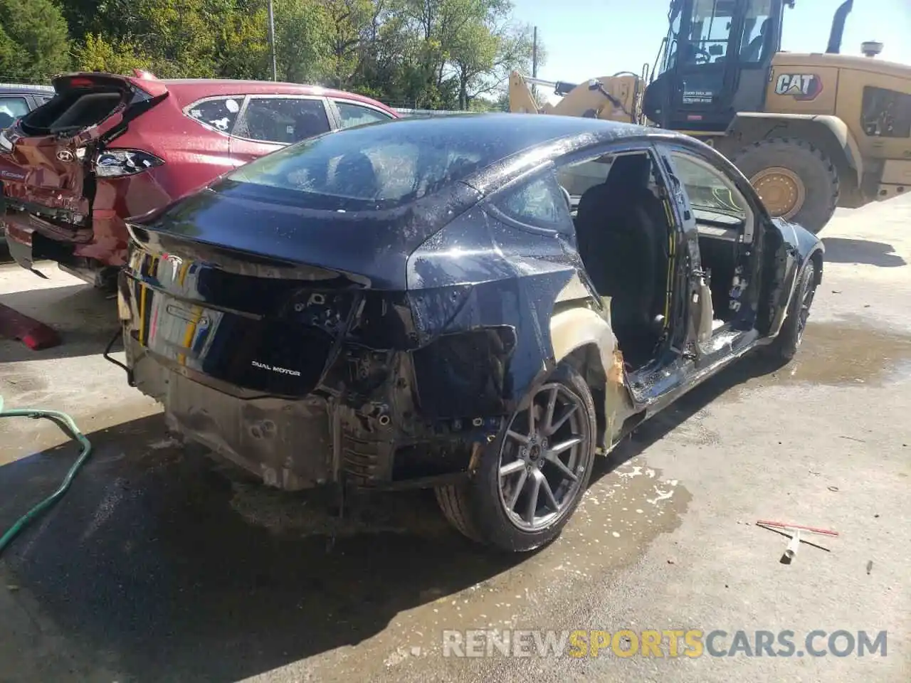 4 Photograph of a damaged car 5YJ3E1EB7NF110633 TESLA MODEL 3 2022