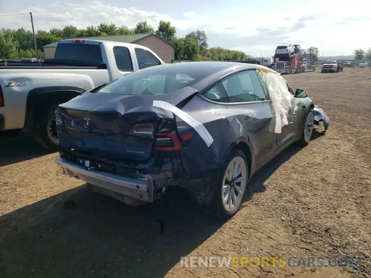 4 Photograph of a damaged car 5YJ3E1EB7NF111202 TESLA MODEL 3 2022