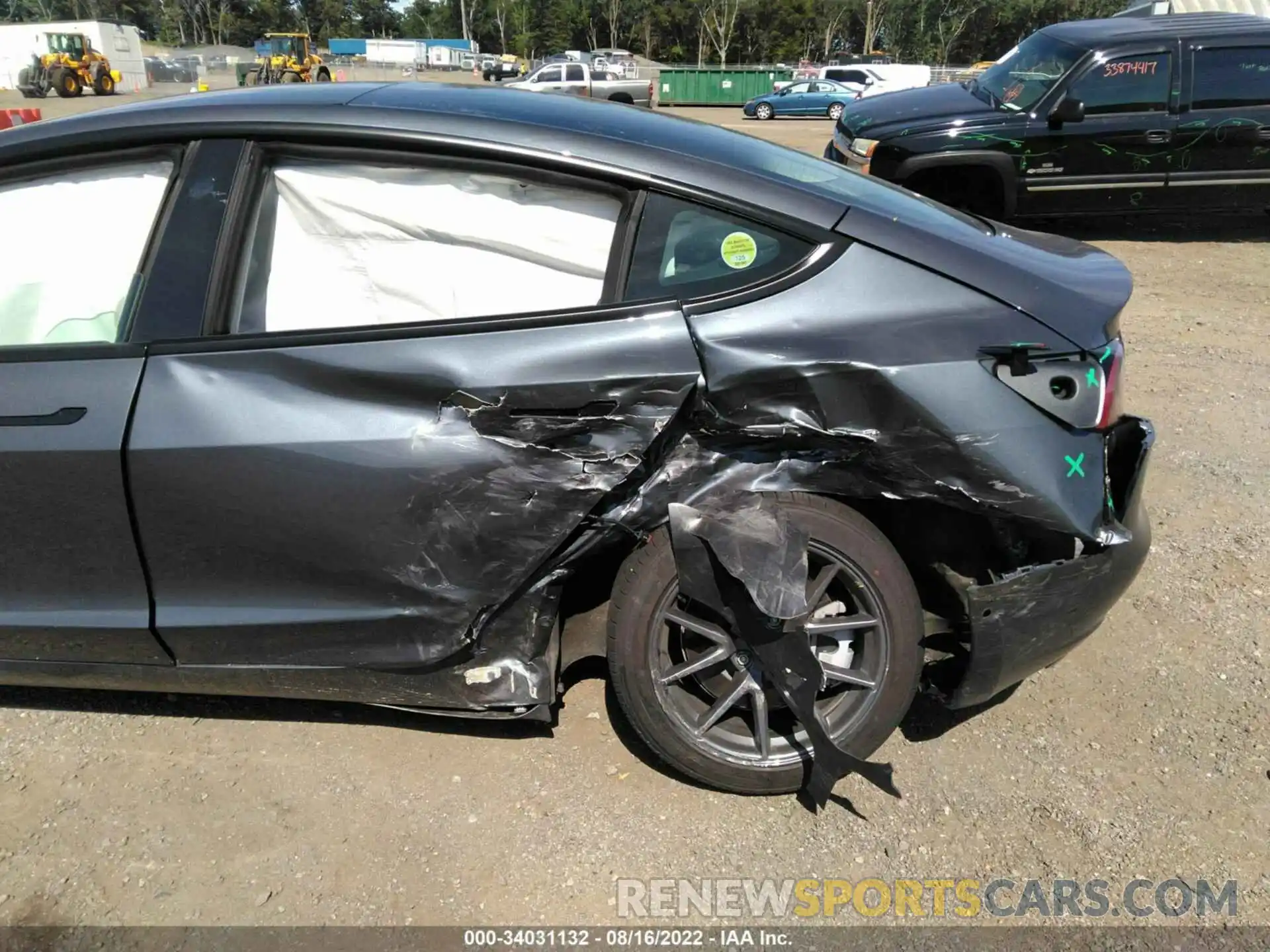 6 Photograph of a damaged car 5YJ3E1EB7NF117159 TESLA MODEL 3 2022