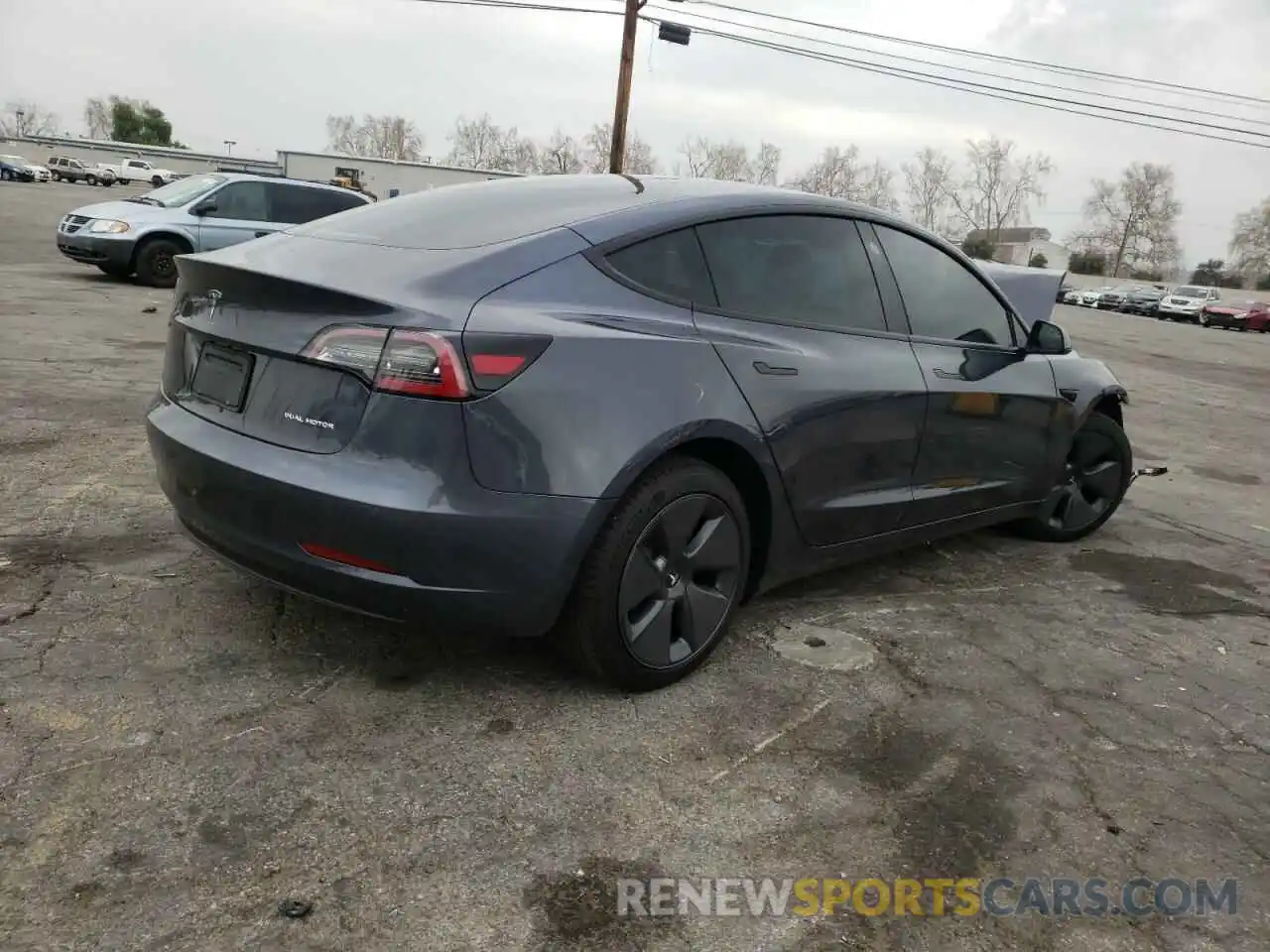 4 Photograph of a damaged car 5YJ3E1EB7NF130736 TESLA MODEL 3 2022