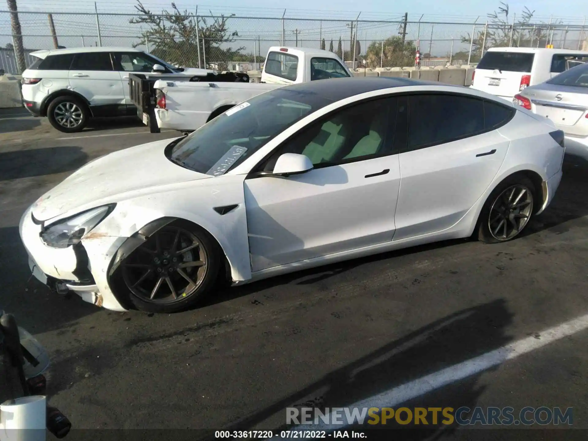 2 Photograph of a damaged car 5YJ3E1EB7NF136438 TESLA MODEL 3 2022