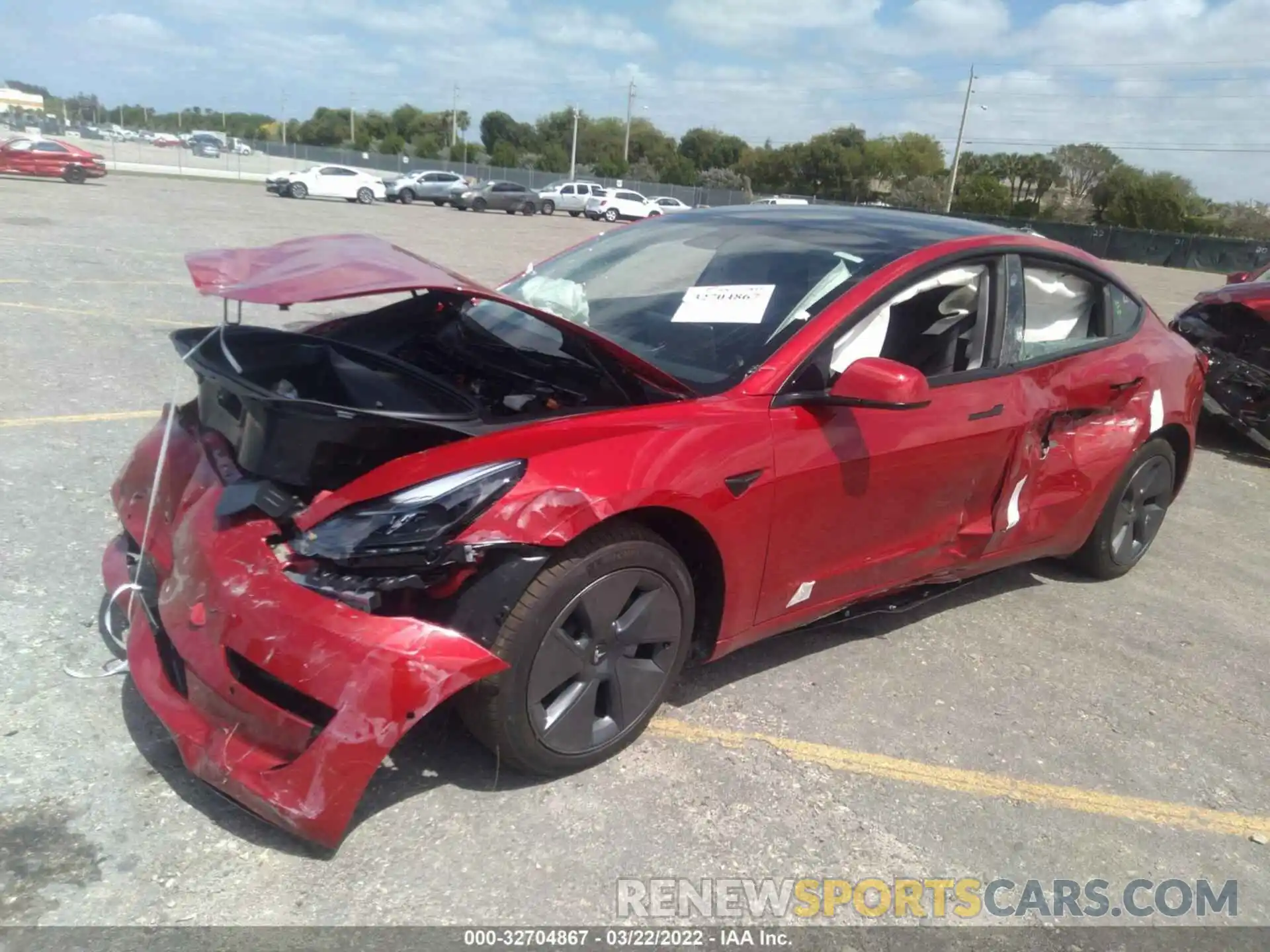 2 Photograph of a damaged car 5YJ3E1EB7NF165969 TESLA MODEL 3 2022