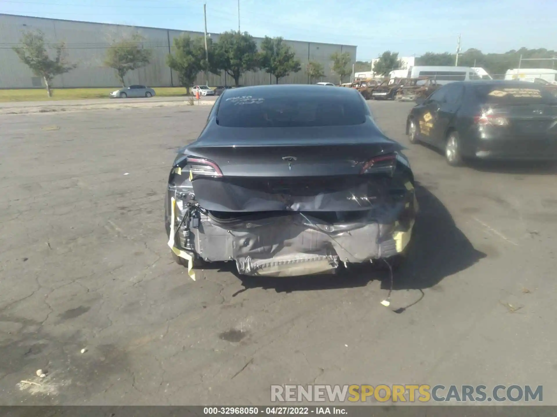 6 Photograph of a damaged car 5YJ3E1EB7NF169438 TESLA MODEL 3 2022