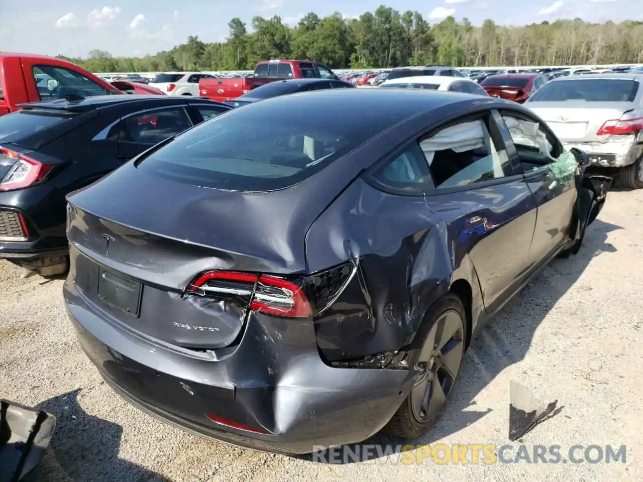 4 Photograph of a damaged car 5YJ3E1EB7NF176728 TESLA MODEL 3 2022