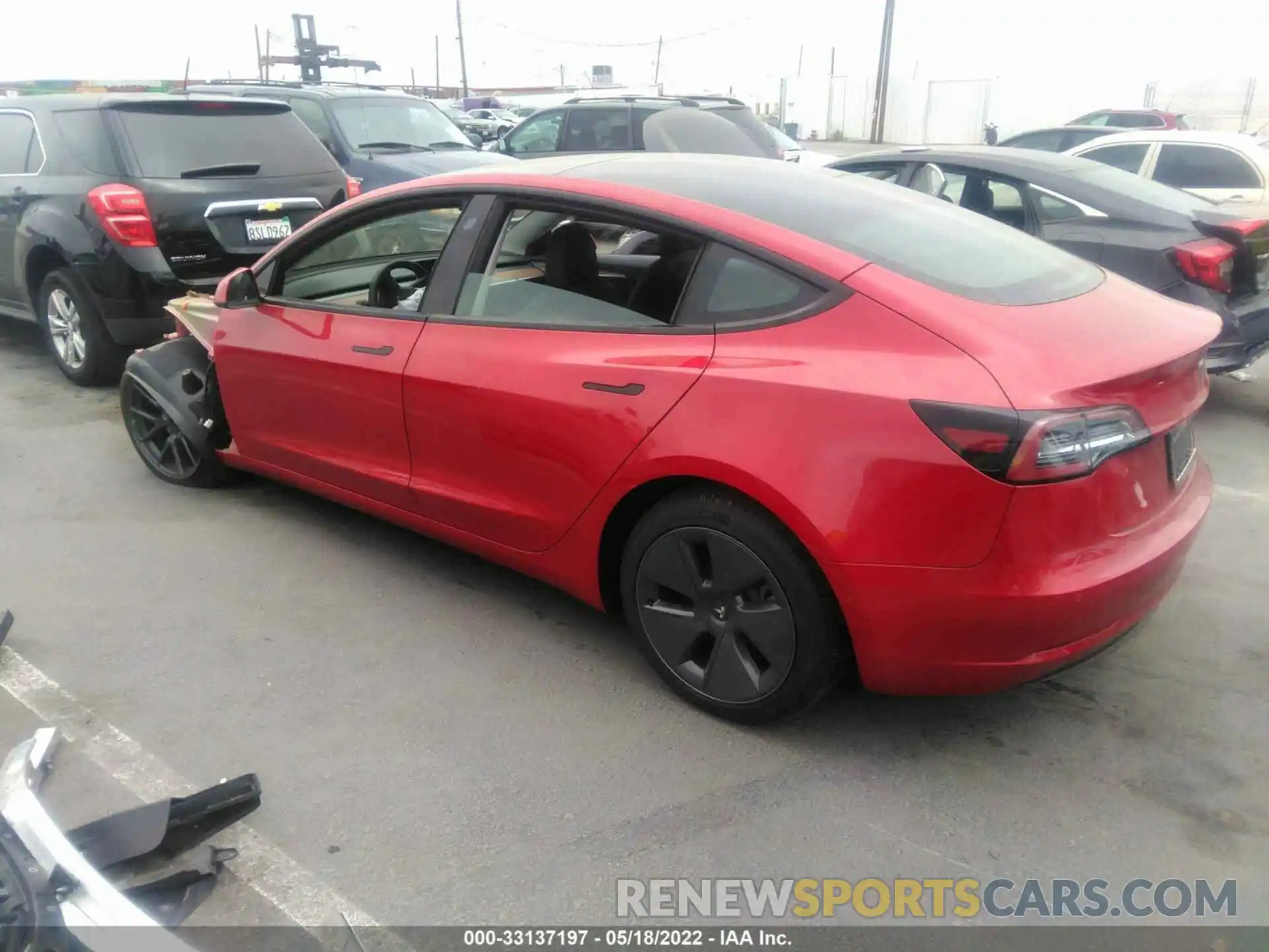 3 Photograph of a damaged car 5YJ3E1EB7NF180598 TESLA MODEL 3 2022