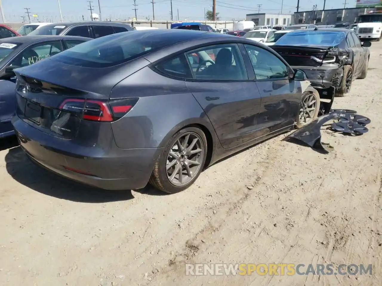 4 Photograph of a damaged car 5YJ3E1EB7NF190936 TESLA MODEL 3 2022