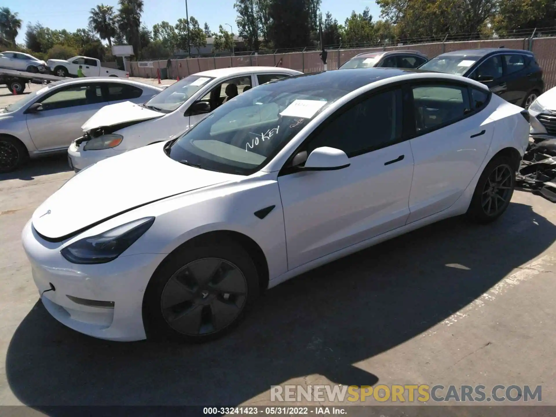 2 Photograph of a damaged car 5YJ3E1EB7NF213132 TESLA MODEL 3 2022