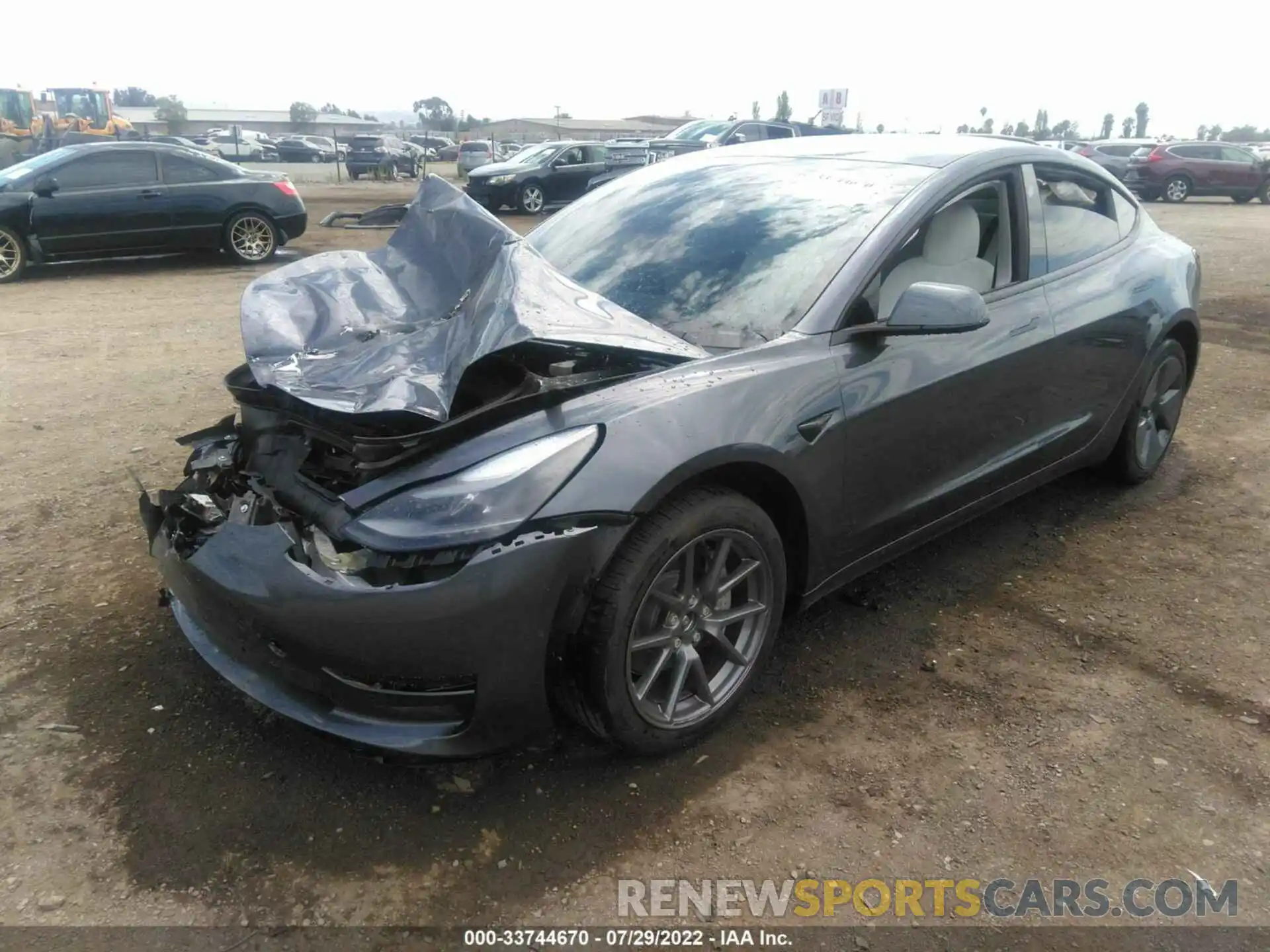 2 Photograph of a damaged car 5YJ3E1EB7NF275730 TESLA MODEL 3 2022