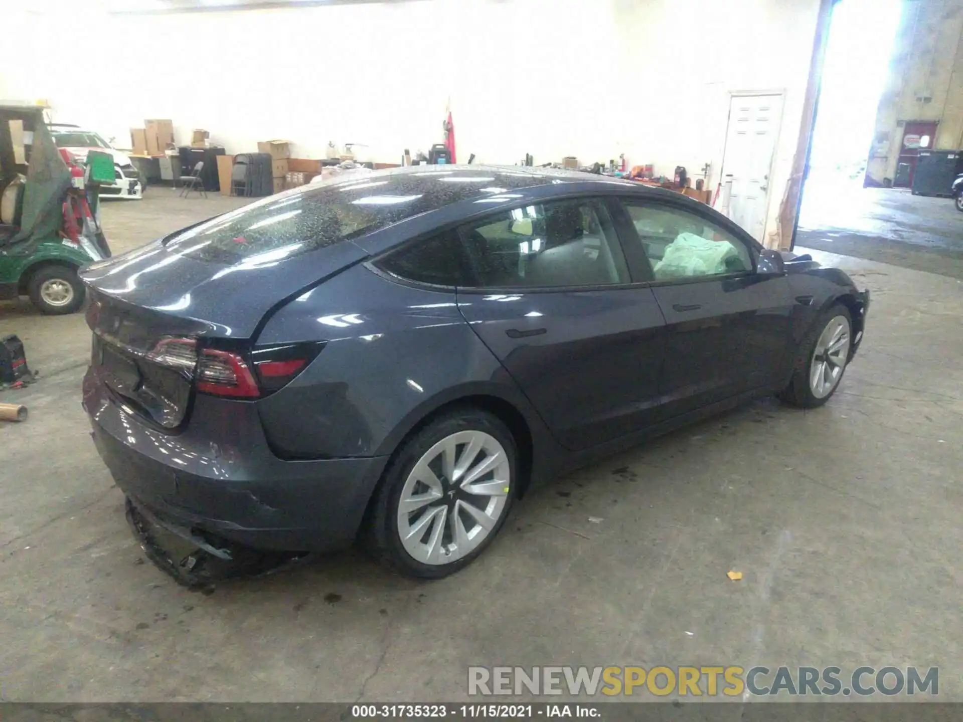 4 Photograph of a damaged car 5YJ3E1EB8NF103223 TESLA MODEL 3 2022