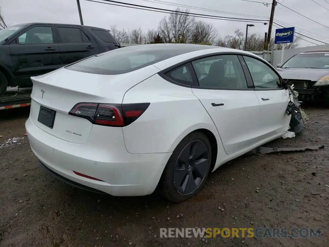 4 Фотография поврежденного автомобиля 5YJ3E1EB8NF106915 TESLA MODEL 3 2022