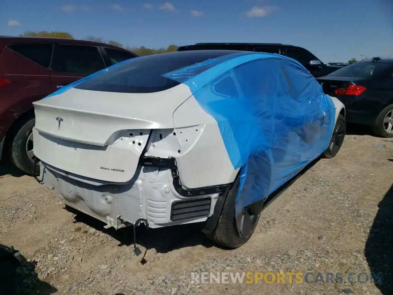 4 Photograph of a damaged car 5YJ3E1EB8NF107014 TESLA MODEL 3 2022