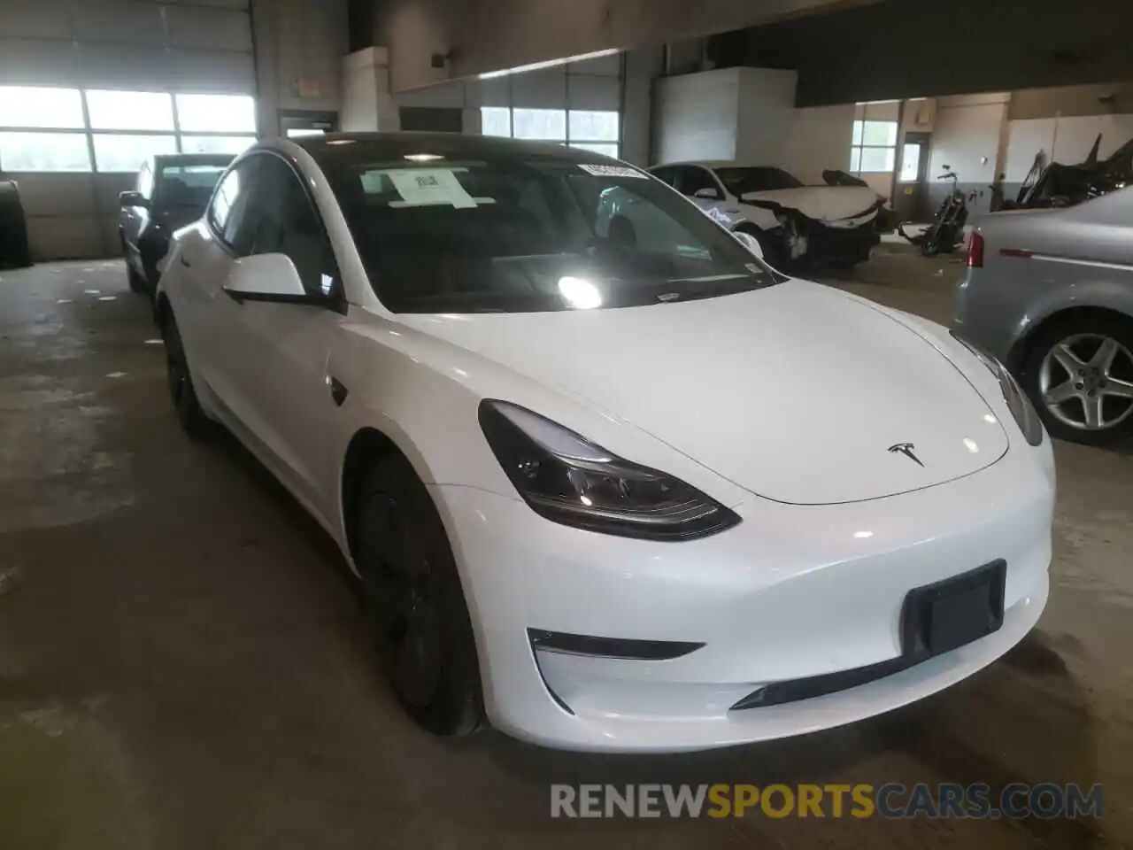 1 Photograph of a damaged car 5YJ3E1EB8NF107403 TESLA MODEL 3 2022