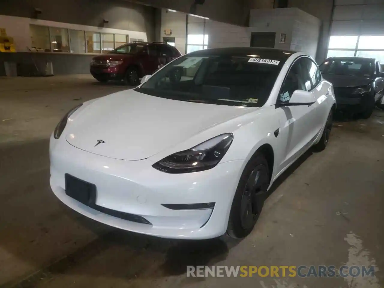 2 Фотография поврежденного автомобиля 5YJ3E1EB8NF107403 TESLA MODEL 3 2022