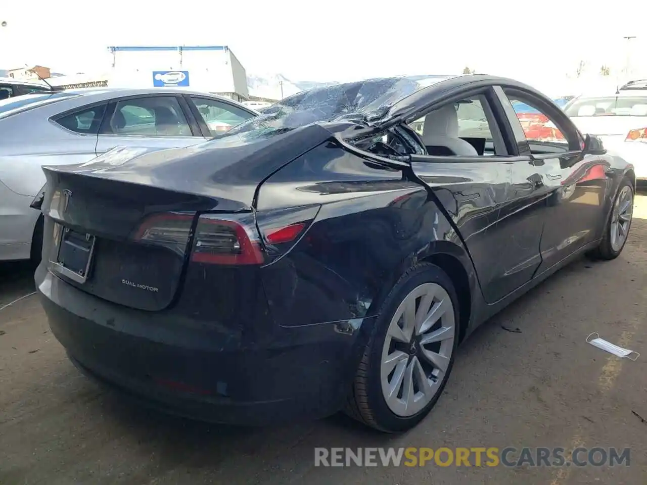 4 Фотография поврежденного автомобиля 5YJ3E1EB8NF123357 TESLA MODEL 3 2022