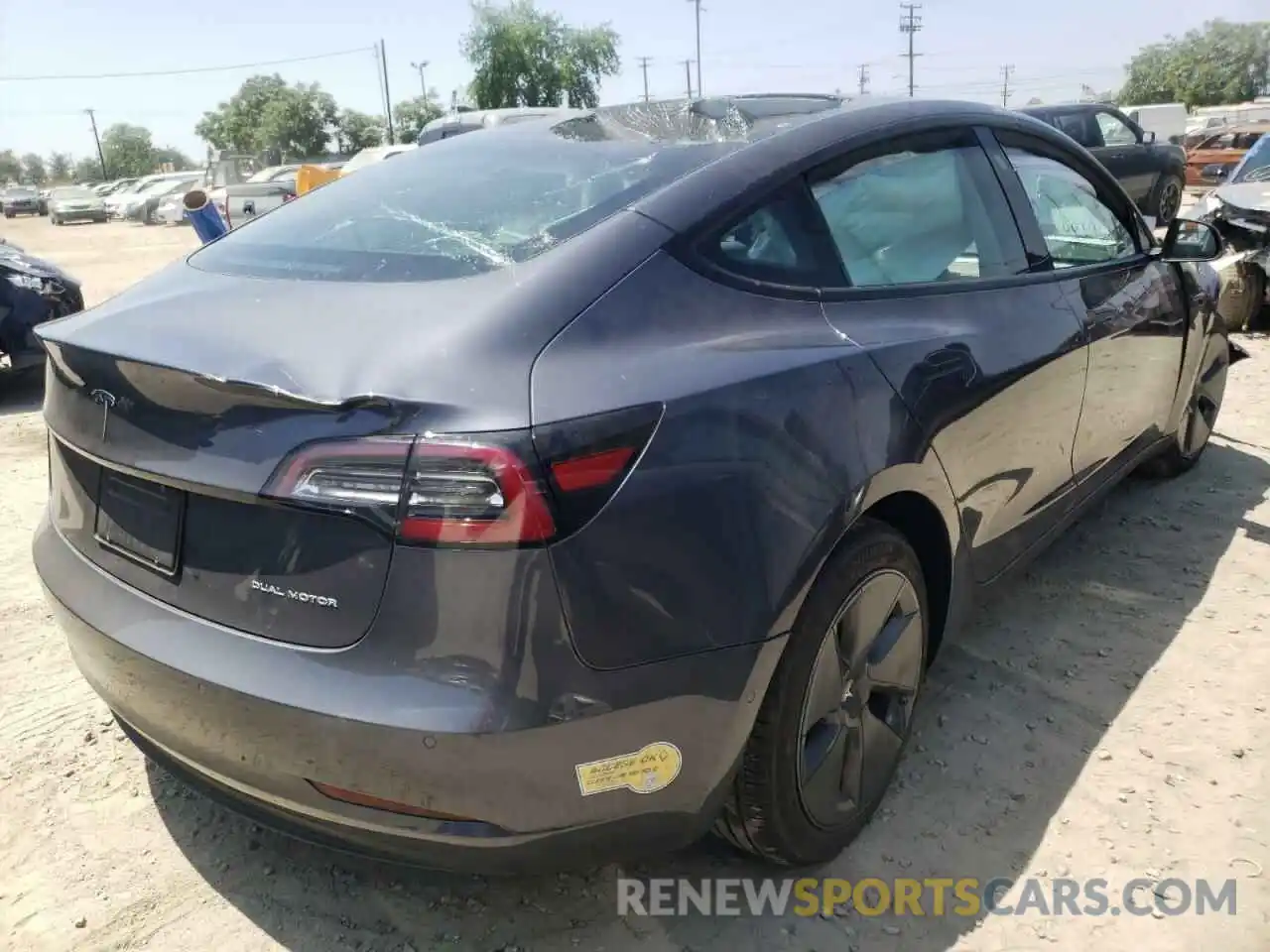 4 Photograph of a damaged car 5YJ3E1EB8NF135878 TESLA MODEL 3 2022