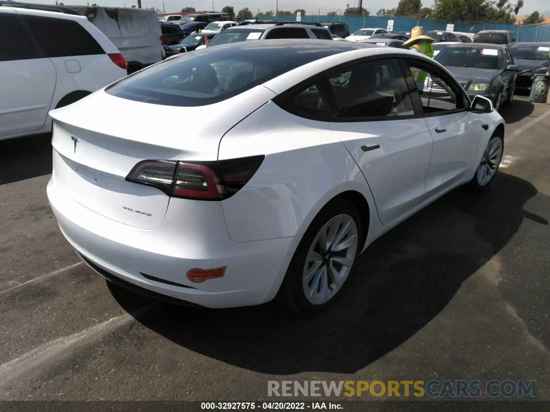 4 Photograph of a damaged car 5YJ3E1EB8NF137548 TESLA MODEL 3 2022